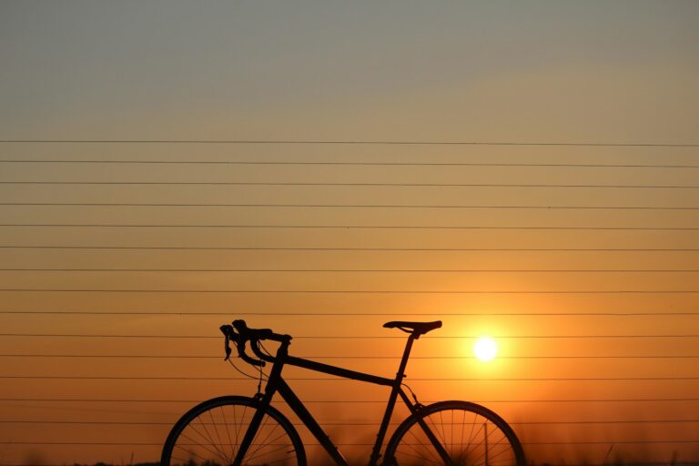 silhouette of road bicycle during sunset