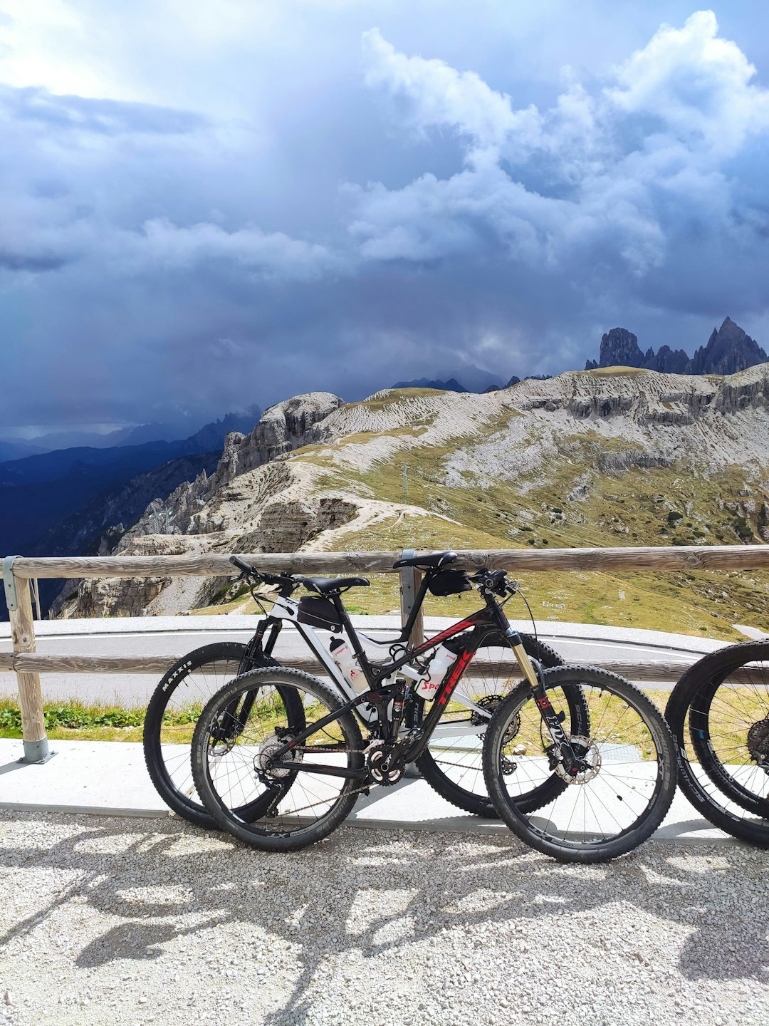 a bicycle parked on a bridge