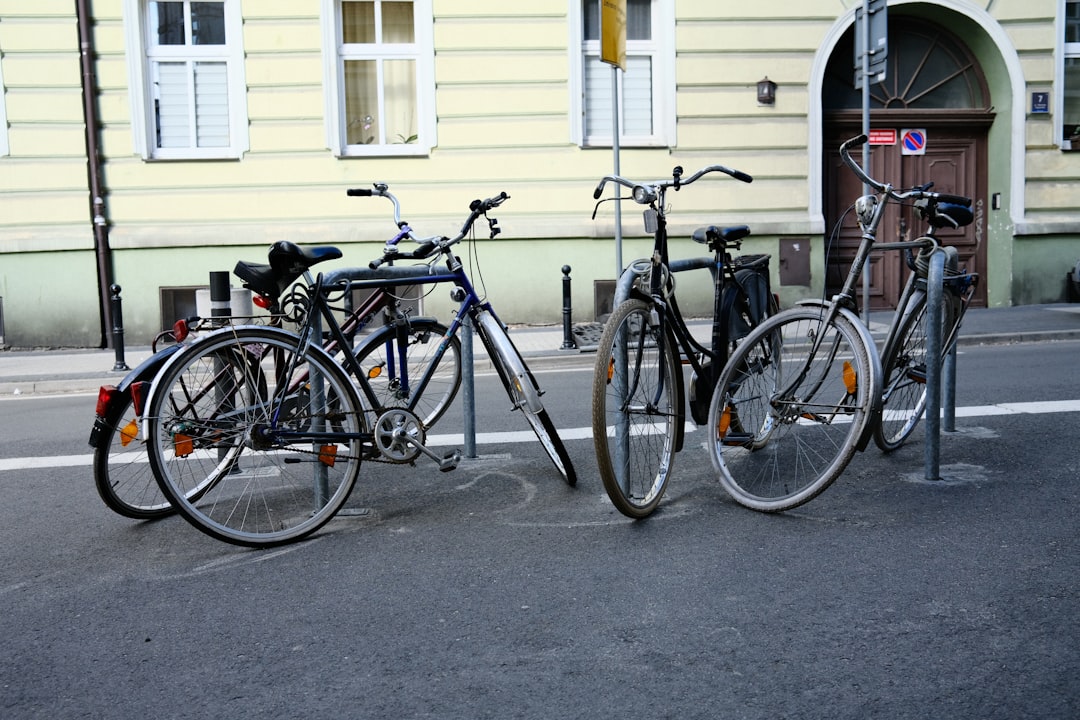 bicycles parked on the side of a street